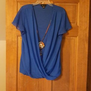Blue flutter sleeve blouse with necklace